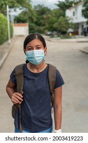 Teenage Girl Getting Ready For School, Girl With Protective Mask Leaving The House