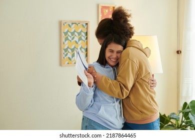 Teenage Girl Hugging Her Friend Received Acceptance Letter From University