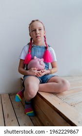 Teenage Girl Learns Financial Literacy. Child Saving Money In Piggy Bank. Future Business Planning Concept.