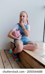 Teenage Girl Learns Financial Literacy. Child Saving Money In Piggy Bank. Future Business Planning Concept.