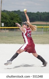 Teenage Girl Playing Softball.