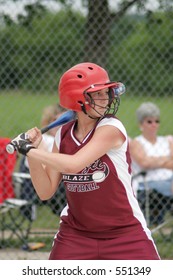 Teenage Girl Playing Softball.