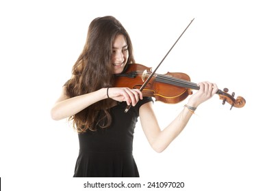 teenage girl plays violin in studio with white background - Powered by Shutterstock