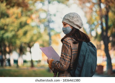 Teenage Girl With A Protective Face Mask On The Way To School