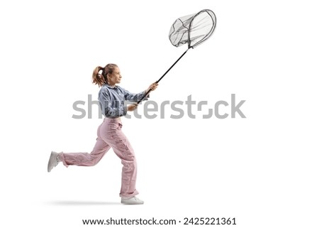Teenage girl running and holding a catching net isolated on white background    