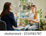 Teenage girl at therapy session with mental health professional