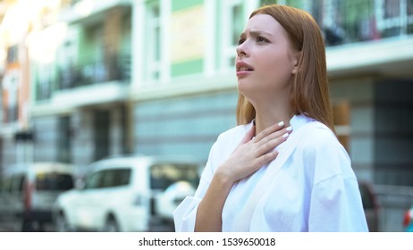 Teenage Girl Trying To Inhale, Contaminated Air, Big City Air Pollution Concept