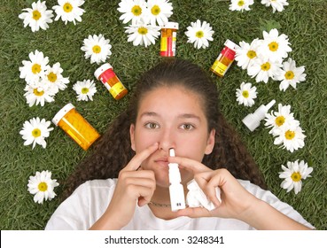 Teenage Girl Using Nose Spray For Her Pollen And Grass Allergies (Allergy Relief)