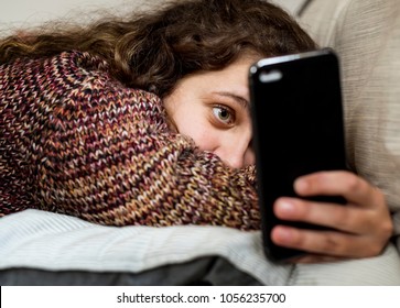 Teenage Girl Using A Smartphone On A Bed Social Media And Addiction Concept