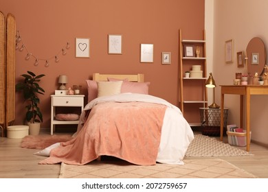 Teenage Girl's Bedroom Interior With Stylish Furniture And Beautiful Decor Elements