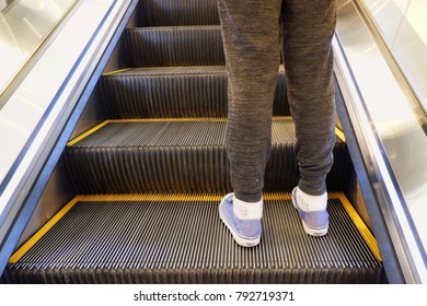 Teenage Girls Legs Standing On Escalator Stock Photo 792719371 ...