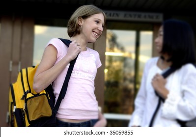 teenage girls talking outside of school - Shutterstock ID 35059855
