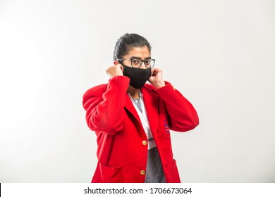 A Teenage Indian Girl In School Uniform Wearing Face Mask During Corona Virus Pandemic In India