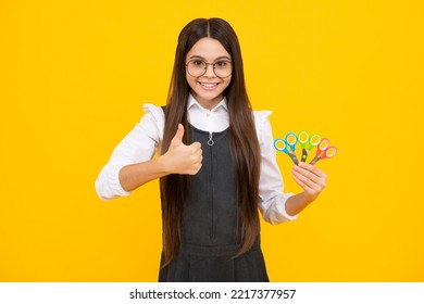 Teenage School Girl With Scissors, Isolated On Yellow Background. Child Creativity, Arts And Crafts.