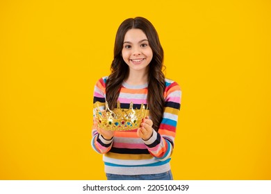 Teenage Selfish Girl Celebrates Success Victory. Teen Child In Queen Crown Isolated On Yellow Background. Princess In Tiara. Prom Party. Happy Teenager, Positive And Smiling Emotions Of Teen Girl.