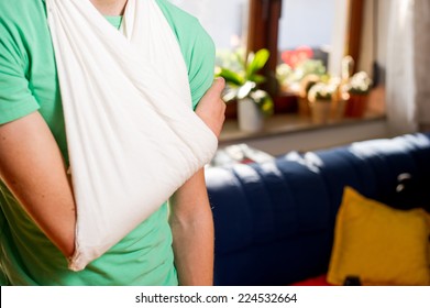 Teenager With Arm In A Sling.