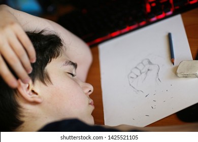 Teenager Boy Art School Student Sleep On His Homework Drawing Close Up Photo