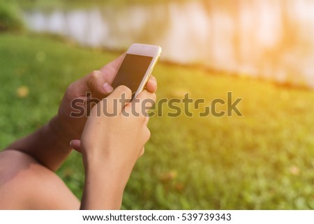 Teenager boy hand with smartphone. Influencer millennial Using Social Media on Smartphone, Like, Follower, Comment and share on social. self absorbed new generation of young people