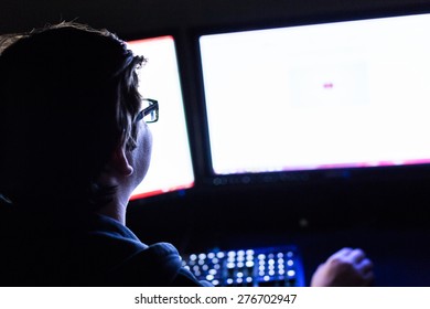 Teenager Boy On Computer In His Room Late At Night.