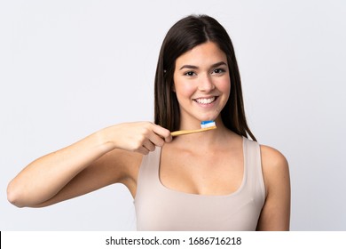 Teenager Brazilian Girl Brushing Her Teeth Over Isolated White Background