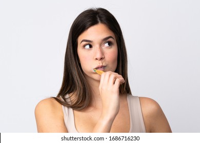 Teenager Brazilian Girl Brushing Her Teeth Over Isolated White Background