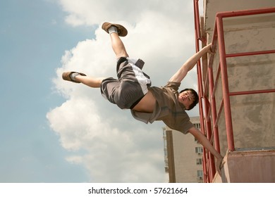 Teenager carries out dangerous exercises - Powered by Shutterstock