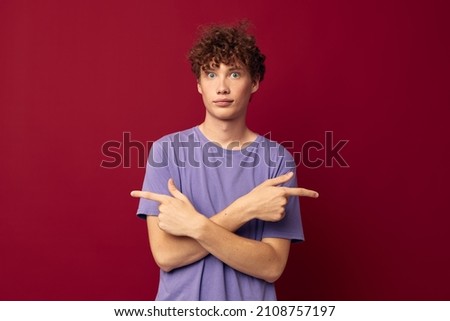 teenager fashion posing hand gestures red background unaltered