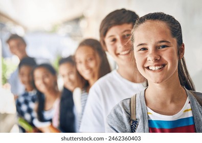 Teenager, friends and portrait for campus education or learning development, growth or scholarship. Girls, boys and row in building hallway with books for student in middle school, group or smile - Powered by Shutterstock