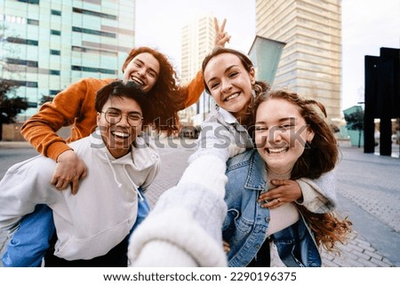 Teenager friends taking selfie portrait in the city - Happy generation z youngsters having fun together