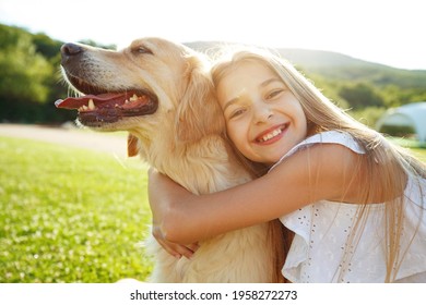 Teenager girl with a dog in nature. High quality photo. - Powered by Shutterstock