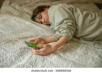 Teenager Girl Holding Phone With Green Screen, Adolescent Girl Using Phone, Modern Digital Technologies