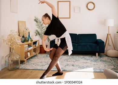 Teenager Girl Practicing Ballet Online Classes At Home. Woman Dancing Indoors