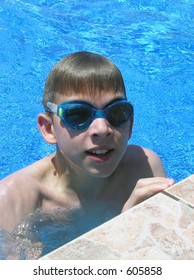 Teenager With Googles In The Swimming Pool - Crete, Greece