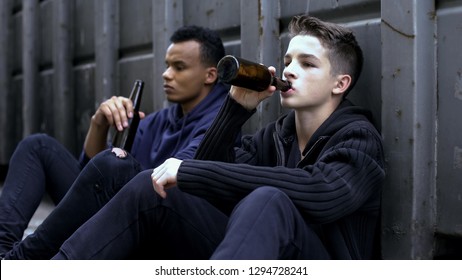 Teenager Guys Drinking Beer Sitting On Road, Bad Company Influence, Experience