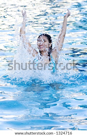 Teenager having fun at swimming pool