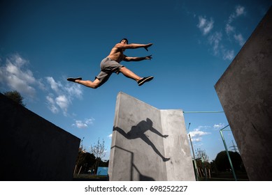 Teenager Jump Parkour On The Walls