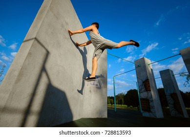 Teenager Jump Parkour On The Walls