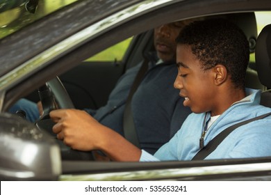 Teenager learning how to drive.