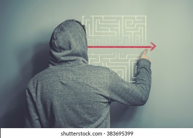 Teenager Looking For Shortcut To A Maze 