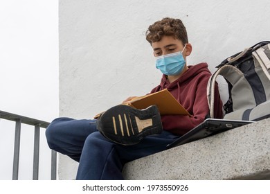 Teenager With Mask Getting Ready For Back To School