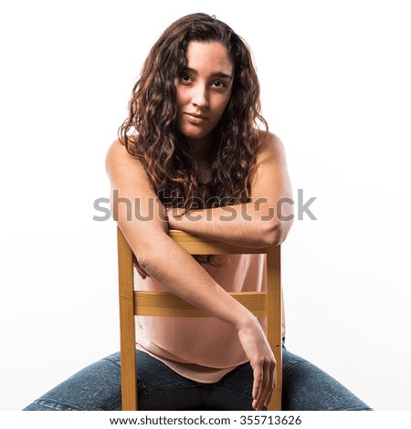 Similar – barefoot young woman sitting barefoot in a window frame