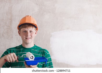 Teenager Painting The Wall