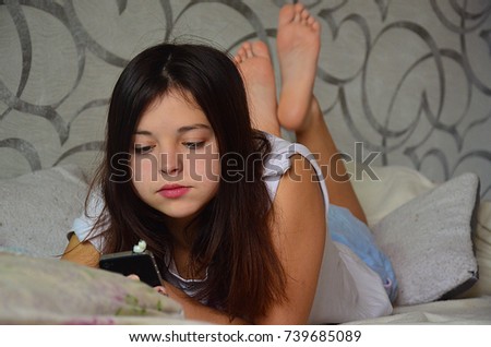 
teenager with phone