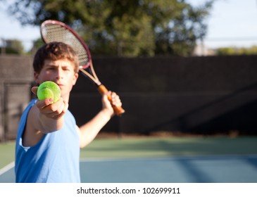 Teenager Playing Tennis With Determination