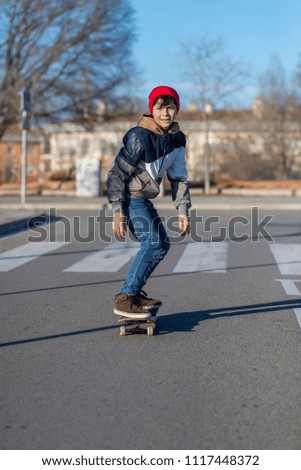 Similar – Image, Stock Photo teenager practicing with skateboard at sunrise city