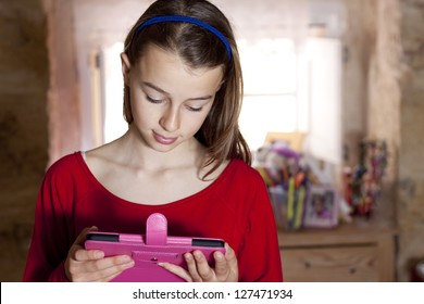 Teenager Reading From Her Ebook