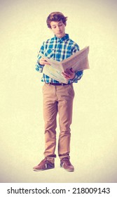 Teenager Reading A Newspaper