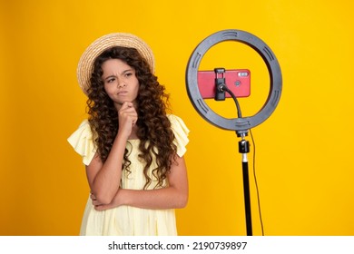 Teenager Recording Online Media Video. Teen Girl Streaming Online And Sharing Social Media Content By Mobile Phone App Network. Thinking Teenage Girl, Thoughtful Emotion.