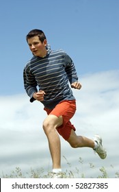 Teenager Running In Nature