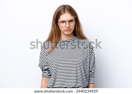 Teenager Russian girl isolated on white background with sad expression